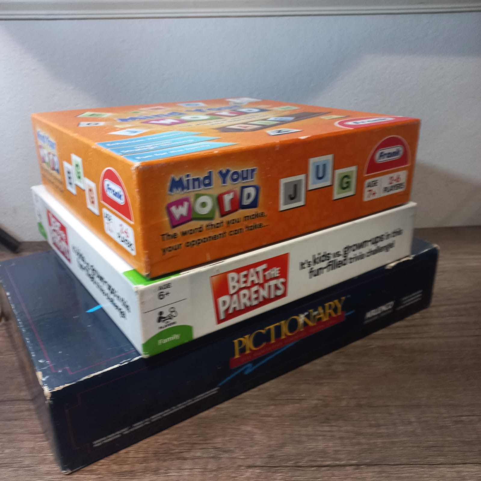 Bundle of 3 Board Games: Pictionary, Mind Your Word, and Beat The Parents