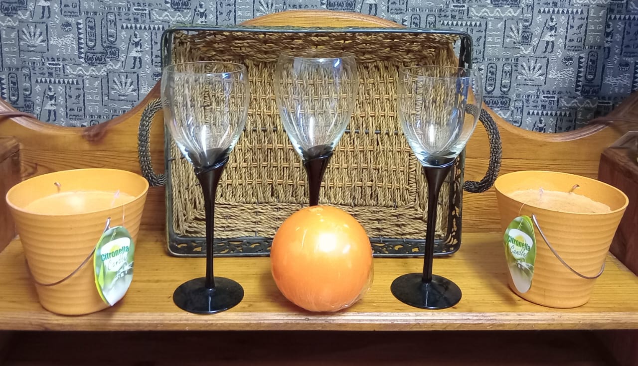 Decorative Tray, Three Stemmed Glasses, and Two Citronella Candles