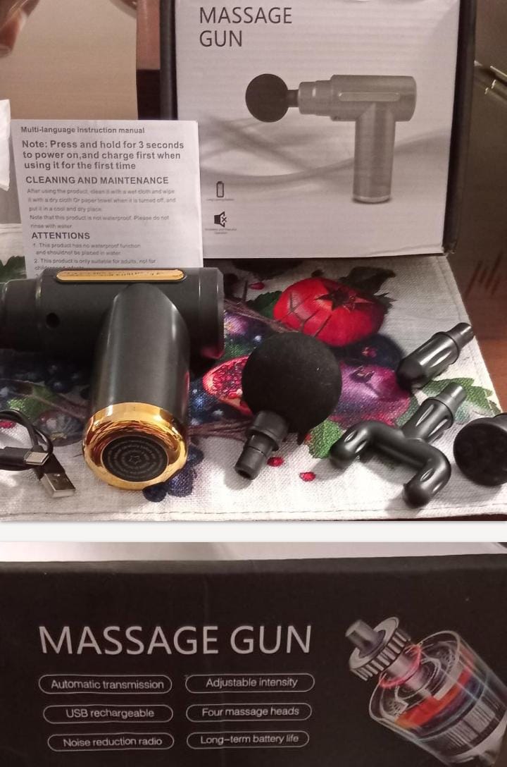 Massage Gun with Accessories and Packaging